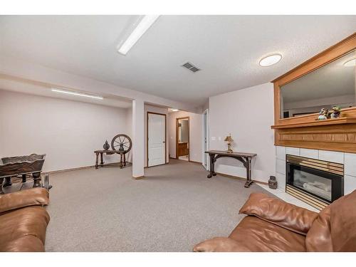 15 Carmel Close Ne, Calgary, AB - Indoor With Fireplace