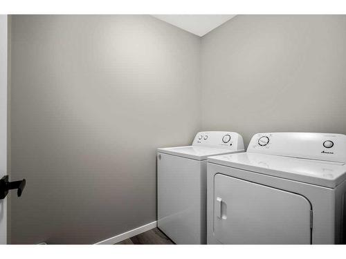 169 Yorkville Boulevard Sw, Calgary, AB - Indoor Photo Showing Laundry Room