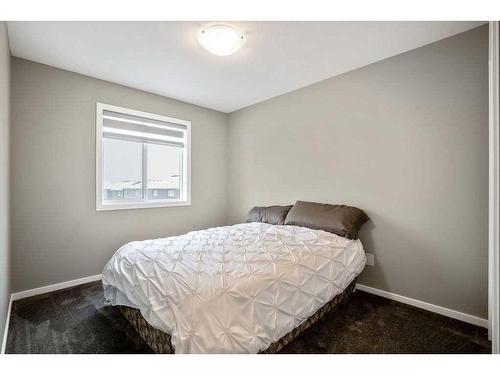 169 Yorkville Boulevard Sw, Calgary, AB - Indoor Photo Showing Bedroom