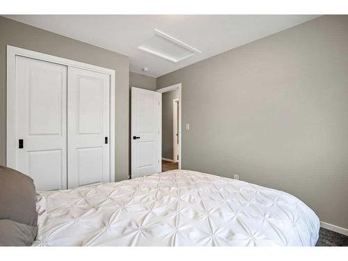 169 Yorkville Boulevard Sw, Calgary, AB - Indoor Photo Showing Bedroom