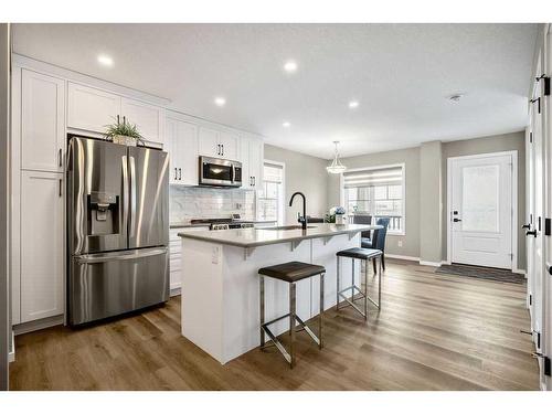 169 Yorkville Boulevard Sw, Calgary, AB - Indoor Photo Showing Kitchen With Stainless Steel Kitchen With Upgraded Kitchen