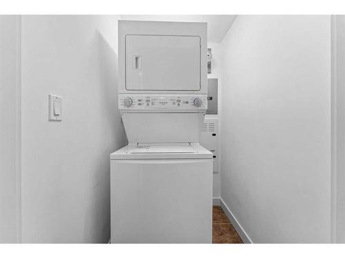 906-8880 Horton Road Sw, Calgary, AB - Indoor Photo Showing Laundry Room