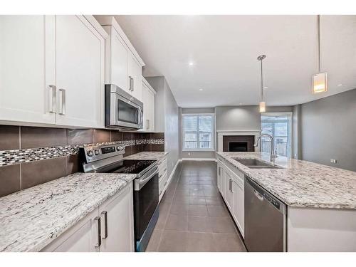 59 Nolanlake View Nw, Calgary, AB - Indoor Photo Showing Kitchen With Stainless Steel Kitchen With Double Sink With Upgraded Kitchen