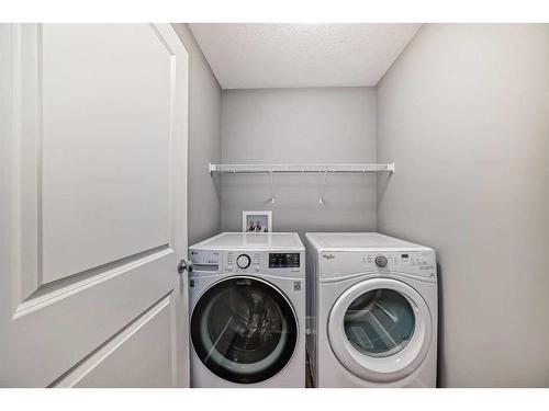 59 Nolanlake View Nw, Calgary, AB - Indoor Photo Showing Laundry Room