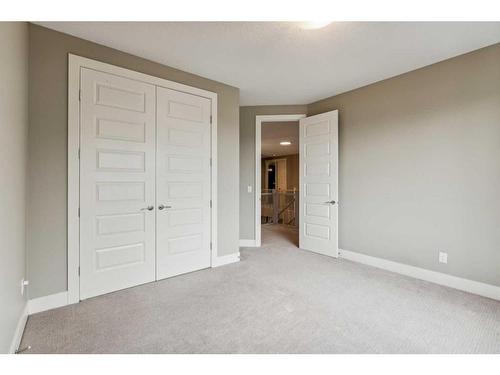 156 Rainbow Falls Glen, Chestermere, AB - Indoor Photo Showing Other Room