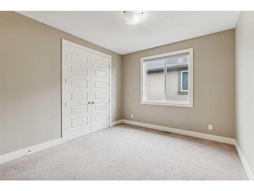 156 Rainbow Falls Glen, Chestermere, AB - Indoor Photo Showing Other Room