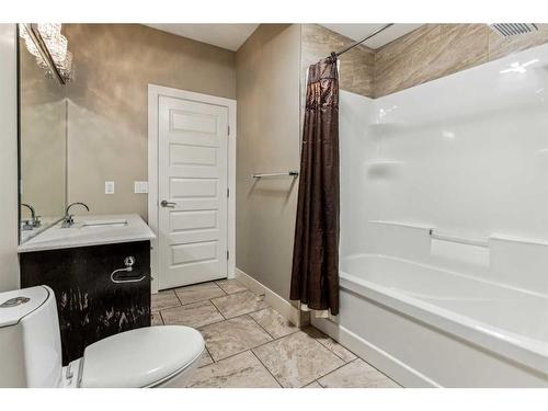 156 Rainbow Falls Glen, Chestermere, AB - Indoor Photo Showing Bathroom