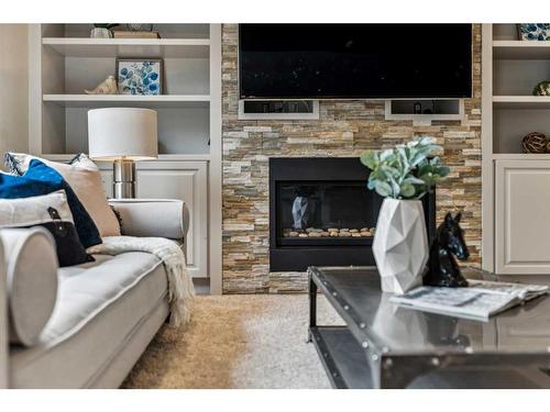 156 Rainbow Falls Glen, Chestermere, AB - Indoor With Fireplace