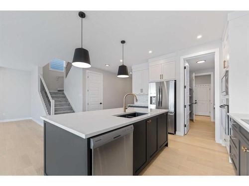 15 South Shore Road, Chestermere, AB - Indoor Photo Showing Kitchen With Double Sink With Upgraded Kitchen