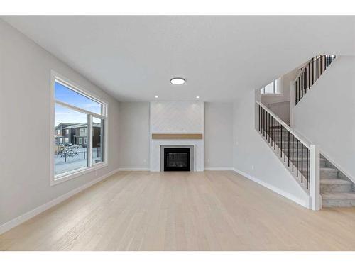 15 South Shore Road, Chestermere, AB - Indoor Photo Showing Living Room With Fireplace