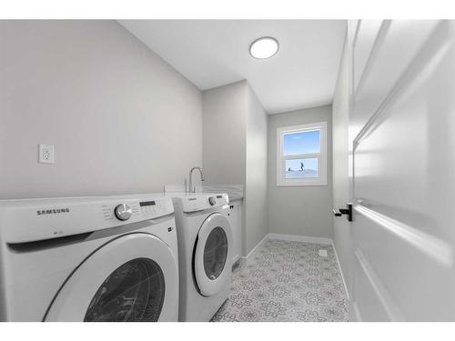 15 South Shore Road, Chestermere, AB - Indoor Photo Showing Laundry Room