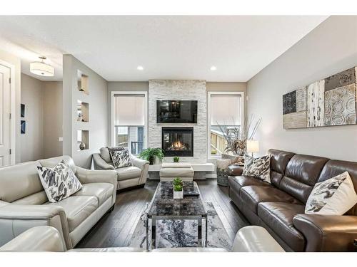 3441 Kerry Park Road Sw, Calgary, AB - Indoor Photo Showing Living Room With Fireplace