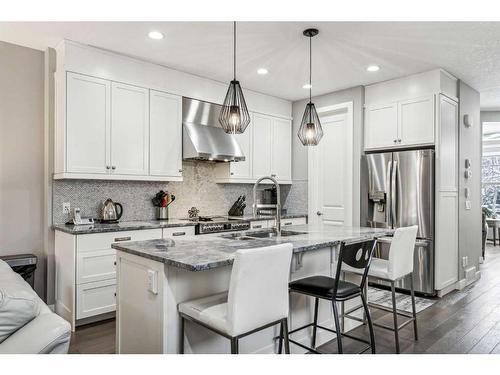 3441 Kerry Park Road Sw, Calgary, AB - Indoor Photo Showing Kitchen With Double Sink With Upgraded Kitchen