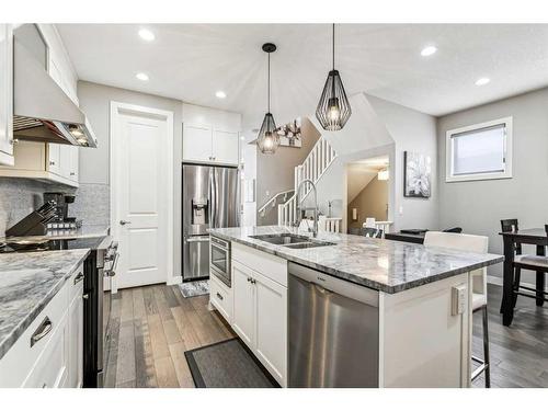 3441 Kerry Park Road Sw, Calgary, AB - Indoor Photo Showing Kitchen With Double Sink With Upgraded Kitchen