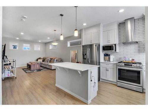 212 Cornergate Row Ne, Calgary, AB - Indoor Photo Showing Kitchen With Stainless Steel Kitchen With Upgraded Kitchen