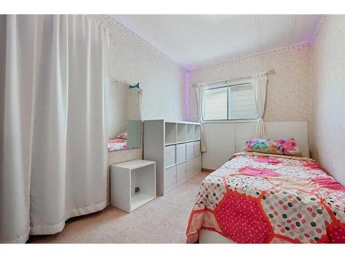 102 Brentwood Drive, Strathmore, AB - Indoor Photo Showing Bedroom