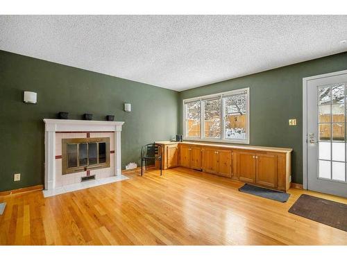 4028 Chatham Place Nw, Calgary, AB - Indoor Photo Showing Other Room With Fireplace