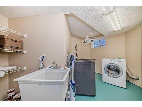 100 Arbour Ridge Circle Nw, Calgary, AB - Indoor Photo Showing Laundry Room