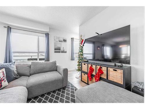 315-40 Carrington Plaza Nw, Calgary, AB - Indoor Photo Showing Living Room