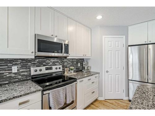 137 West Creek Glen, Chestermere, AB - Indoor Photo Showing Kitchen With Stainless Steel Kitchen With Upgraded Kitchen