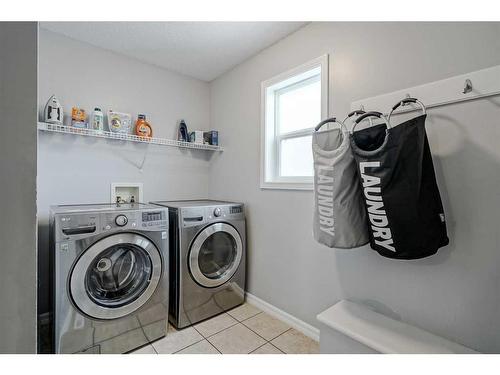 137 West Creek Glen, Chestermere, AB - Indoor Photo Showing Laundry Room