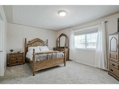 137 West Creek Glen, Chestermere, AB - Indoor Photo Showing Bedroom