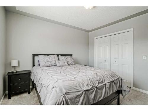 137 West Creek Glen, Chestermere, AB - Indoor Photo Showing Bedroom