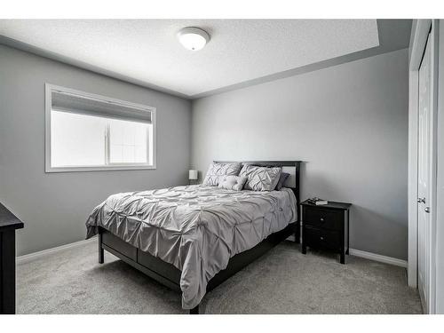 137 West Creek Glen, Chestermere, AB - Indoor Photo Showing Bedroom