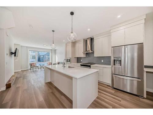 44 Treeline Manor Sw, Calgary, AB - Indoor Photo Showing Kitchen With Double Sink With Upgraded Kitchen