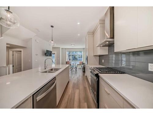 44 Treeline Manor Sw, Calgary, AB - Indoor Photo Showing Kitchen With Double Sink With Upgraded Kitchen