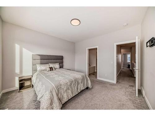 44 Treeline Manor Sw, Calgary, AB - Indoor Photo Showing Bedroom