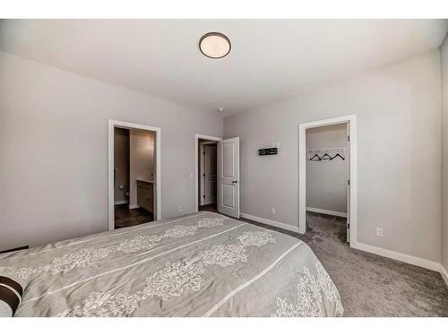 44 Treeline Manor Sw, Calgary, AB - Indoor Photo Showing Bedroom