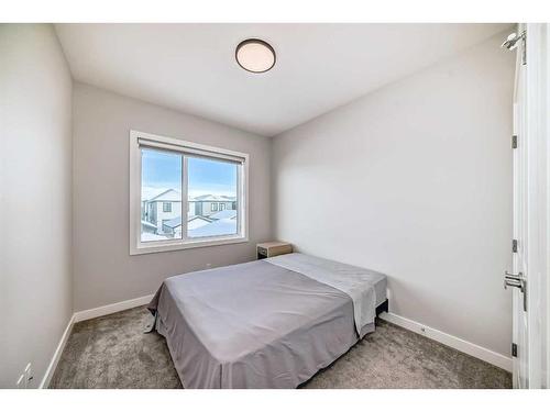 44 Treeline Manor Sw, Calgary, AB - Indoor Photo Showing Bedroom