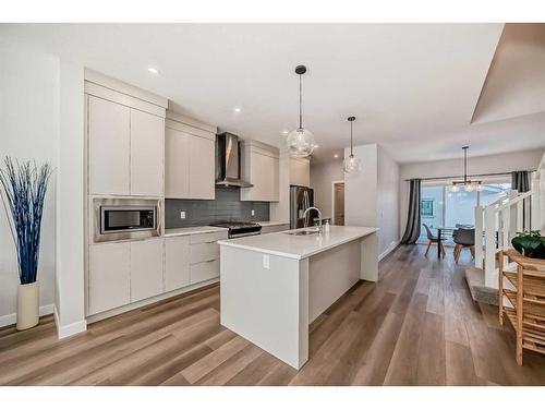 44 Treeline Manor Sw, Calgary, AB - Indoor Photo Showing Kitchen With Upgraded Kitchen