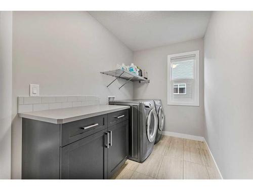 248 Sandpiper Crescent, Chestermere, AB - Indoor Photo Showing Laundry Room