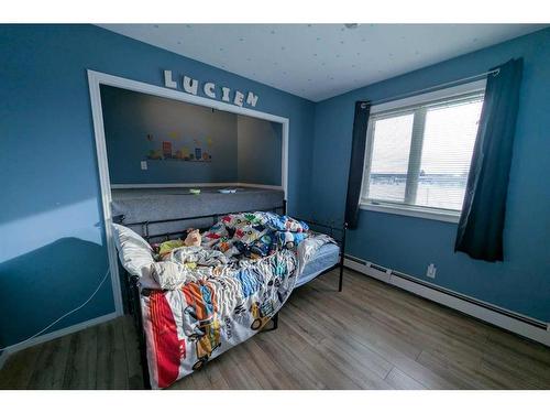 1102 Whitfield Avenue, Crossfield, AB - Indoor Photo Showing Bedroom