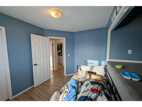 1102 Whitfield Avenue, Crossfield, AB - Indoor Photo Showing Bedroom