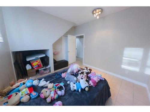 1102 Whitfield Avenue, Crossfield, AB - Indoor Photo Showing Bedroom