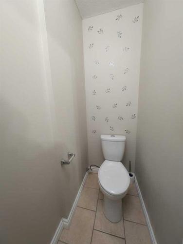 1102 Whitfield Avenue, Crossfield, AB - Indoor Photo Showing Bathroom