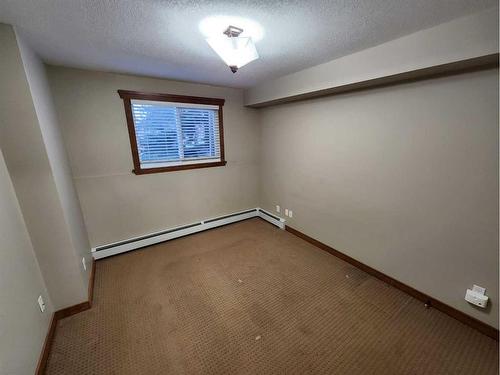 110-315 50 Avenue Sw, Calgary, AB - Indoor Photo Showing Other Room