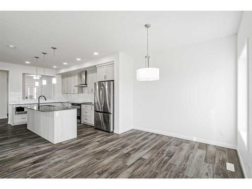 17 Creekstone Place Sw, Calgary, AB - Indoor Photo Showing Kitchen With Stainless Steel Kitchen With Upgraded Kitchen