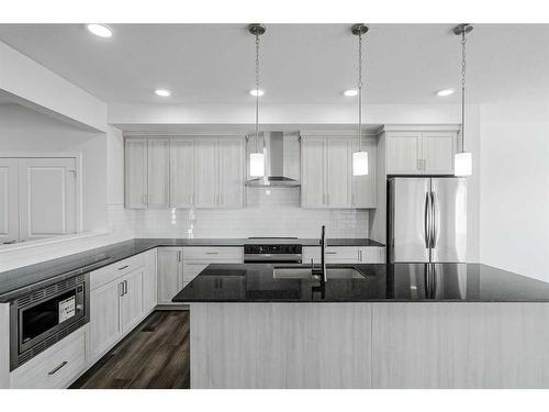 17 Creekstone Place Sw, Calgary, AB - Indoor Photo Showing Kitchen With Stainless Steel Kitchen With Upgraded Kitchen