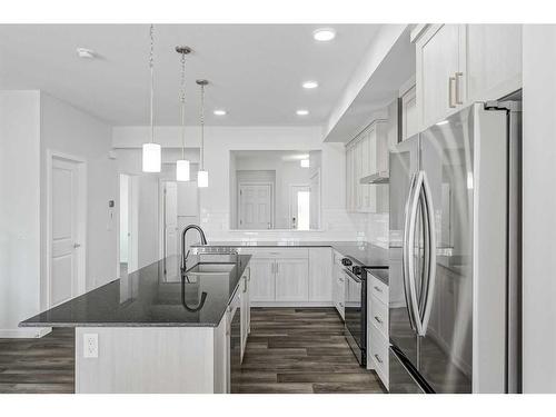 17 Creekstone Place Sw, Calgary, AB - Indoor Photo Showing Kitchen With Stainless Steel Kitchen With Upgraded Kitchen