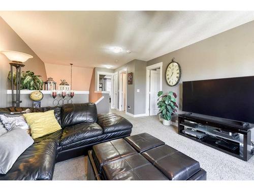 129 Rainbow Falls Boulevard, Chestermere, AB - Indoor Photo Showing Living Room