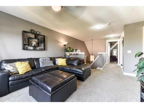 129 Rainbow Falls Boulevard, Chestermere, AB - Indoor Photo Showing Living Room