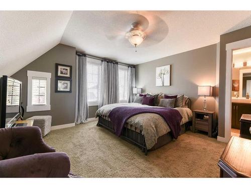 129 Rainbow Falls Boulevard, Chestermere, AB - Indoor Photo Showing Bedroom