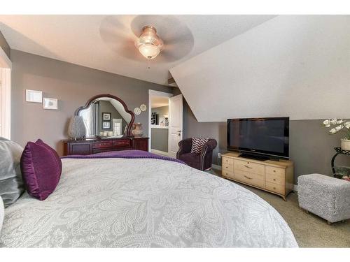 129 Rainbow Falls Boulevard, Chestermere, AB - Indoor Photo Showing Bedroom