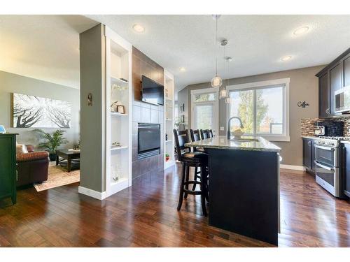 129 Rainbow Falls Boulevard, Chestermere, AB - Indoor Photo Showing Kitchen With Upgraded Kitchen