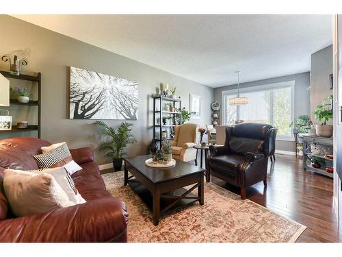 129 Rainbow Falls Boulevard, Chestermere, AB - Indoor Photo Showing Living Room