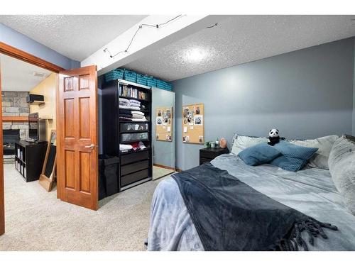 115 Chapala Drive Se, Calgary, AB - Indoor Photo Showing Bedroom